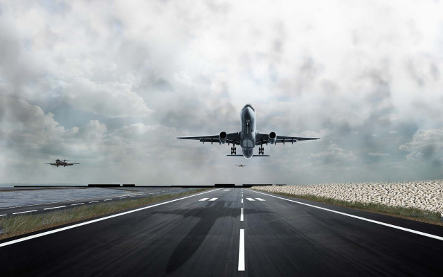 Plane flying runway cloudy sky free wallpaper - medium preview image