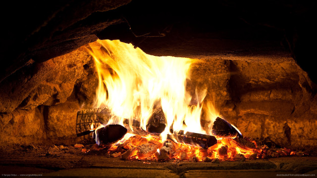 Fireplace burning rocks logs wire free wallpaper - medium preview image