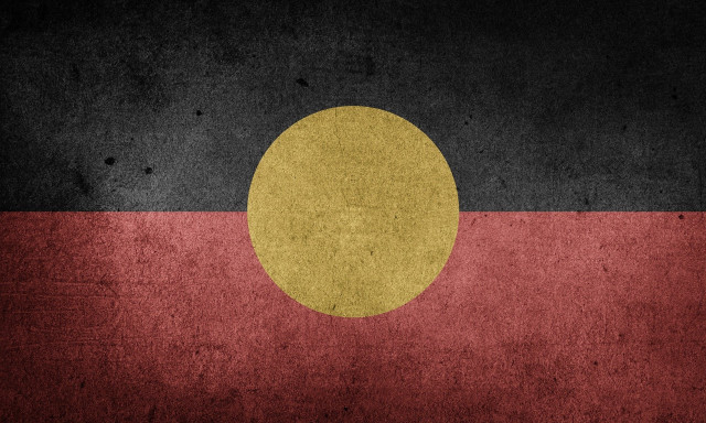 Grungy flag yellow circle black free wallpaper - medium preview image