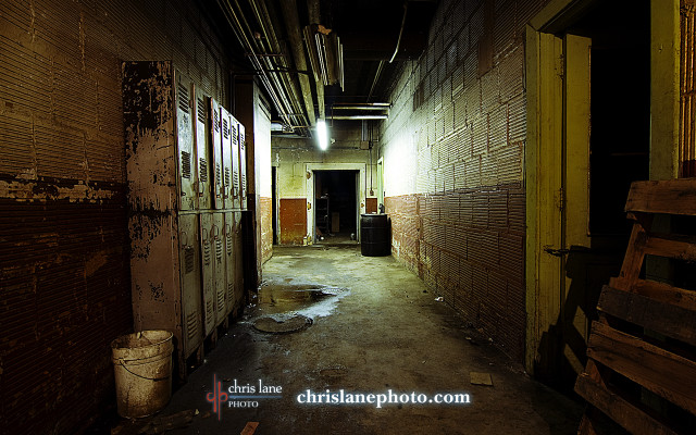 Dark hallway bench trashcan corner free wallpaper - medium preview image