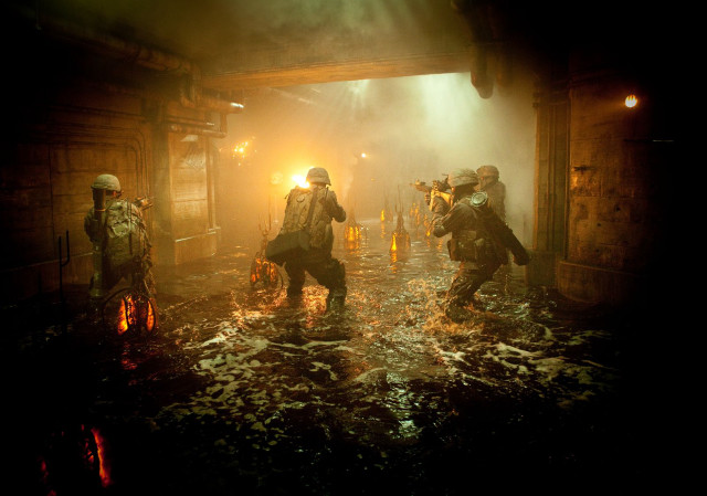 Flooded tunnel group walking lights free wallpaper - medium preview image