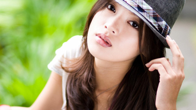 Woman hat posing picture hand free wallpaper - medium preview image