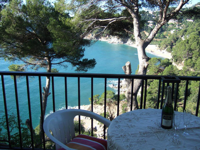 Balcony table chairs water trees free wallpaper - medium preview image