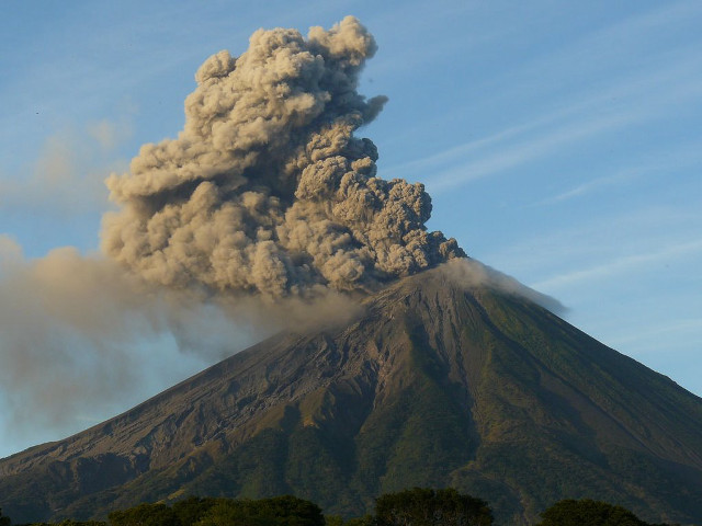 Volcano smoke trees water sky free wallpaper - medium preview image