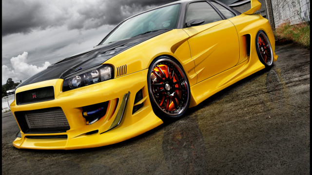 Yellow car street building cloudy free wallpaper - medium preview image