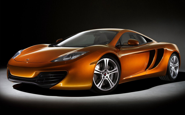 Orange sports car dark room #17 free wallpaper - medium preview image