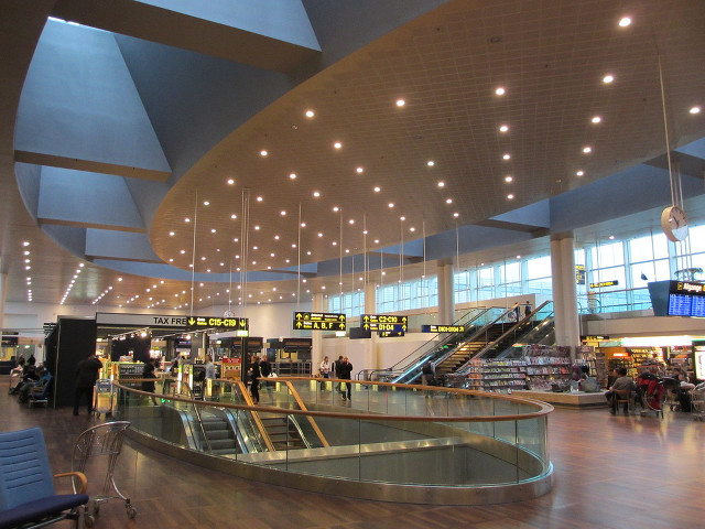 Airport long railing people walking free wallpaper - medium preview image