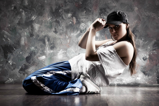 Woman sitting floor arm up free wallpaper - medium preview image