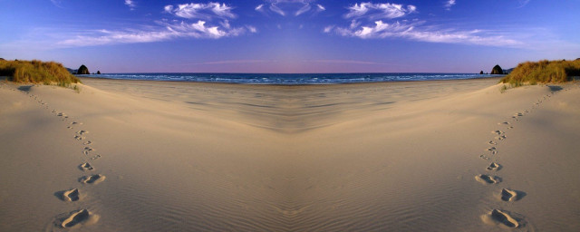 Beach footprints ocean blue sky free wallpaper - medium preview image
