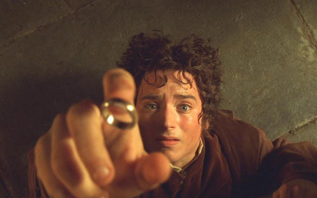 Man pointing finger camera ring free wallpaper - medium preview image