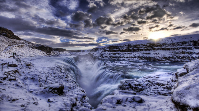 Waterfall snow rocks cloudy sky free wallpaper - medium preview image