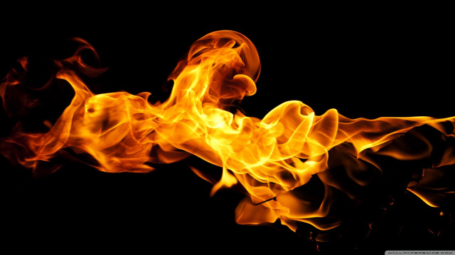 Fiery flames darkness orange glow free wallpaper - medium preview image