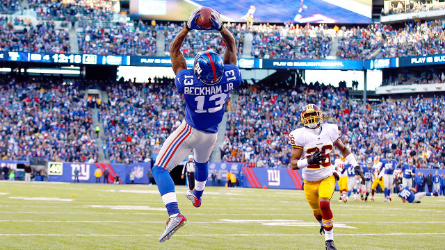 Football player jumping catching ball #2 free wallpaper - medium preview image