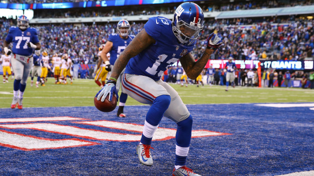 Football player running field ball free wallpaper - medium preview image