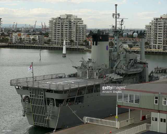 Large ship docked harbor city #2 free wallpaper - medium preview image