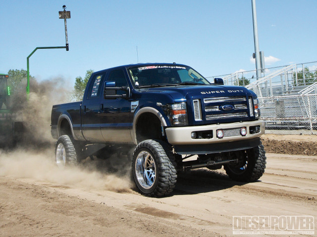 Truck driving dirt road light free wallpaper - medium preview image