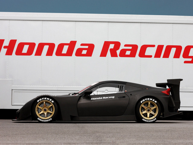Black sports car white truck free wallpaper - medium preview image