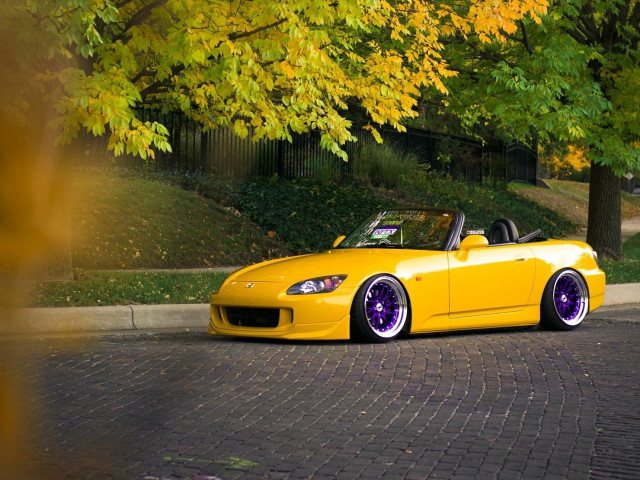 Yellow sports car autumn leaves free wallpaper - medium preview image
