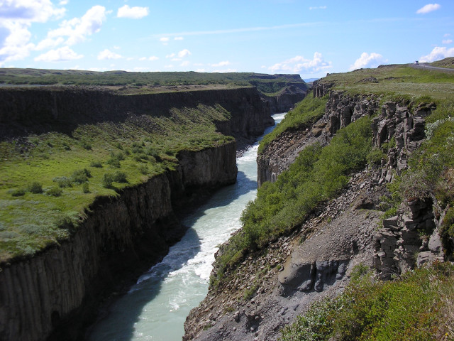 River lush hillside cliff grass free wallpaper - medium preview image