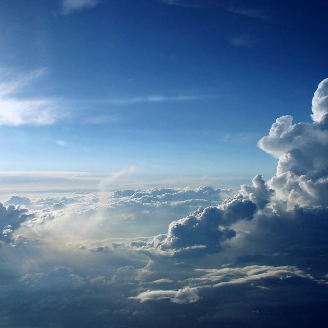 Sky clouds sunlight cityscape ocean free wallpaper - medium preview image