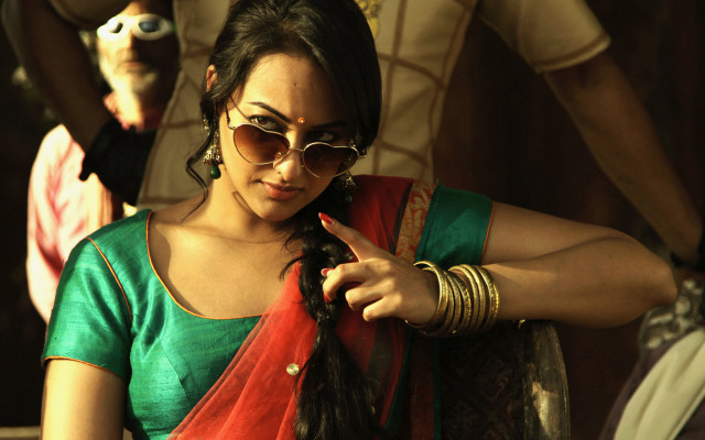 Woman sari pointing man white free wallpaper - medium preview image