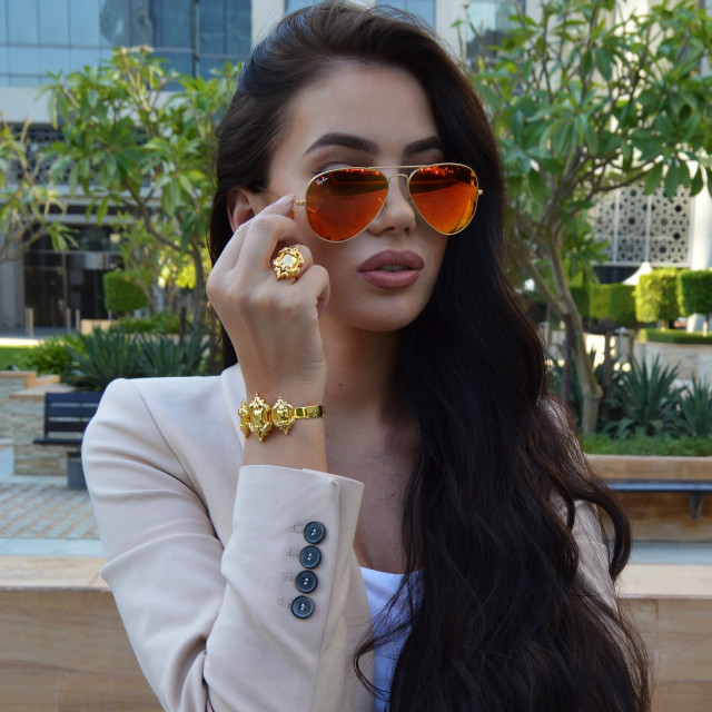 Woman sunglasses white jacket hand free wallpaper - medium preview image