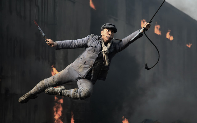 Man hat overalls jumping stick free wallpaper - medium preview image