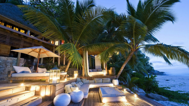 Deck couch umbrellas beach night free wallpaper - medium preview image