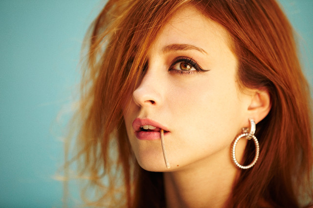 Woman nose piercing serious look free wallpaper - medium preview image