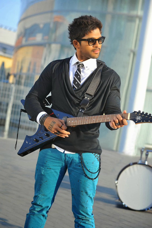 Man suit tie playing guitar free wallpaper - medium preview image