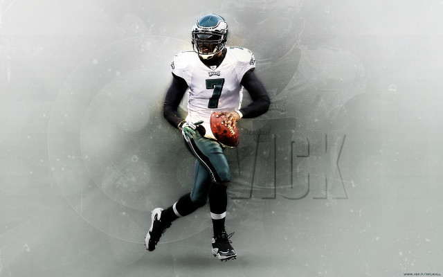 Football player holding ball running free wallpaper - medium preview image
