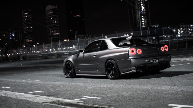 Car parked nighttime rear lights free wallpaper - medium preview image