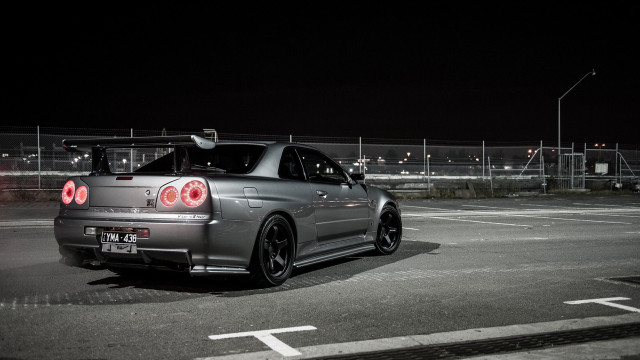 Car parked night lights tail free wallpaper - medium preview image