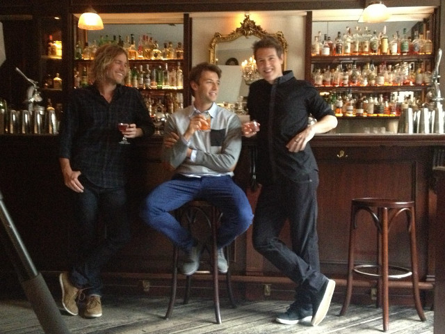 Three men sitting bar drinks free wallpaper - medium preview image