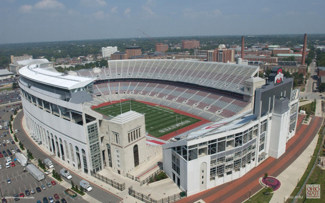 Stadium field building cars parking free wallpaper - medium preview image