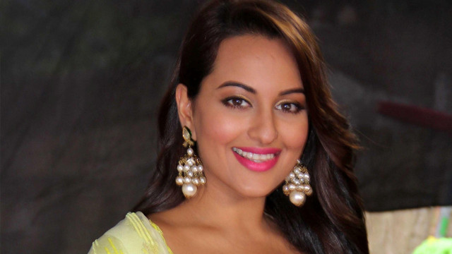 Woman yellow dress large earrings free wallpaper - medium preview image