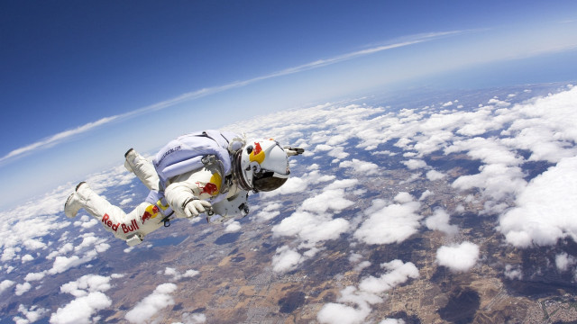 Man white suit air clouds free wallpaper - medium preview image
