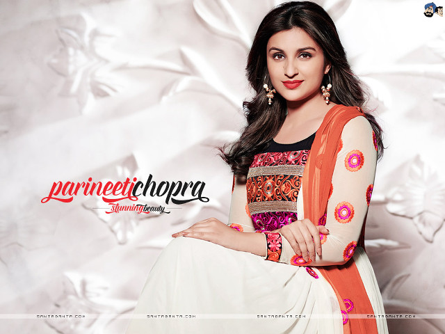 Woman orange dress white background free wallpaper - medium preview image