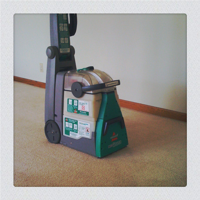 Carpet cleaner sitting floor green free wallpaper - medium preview image