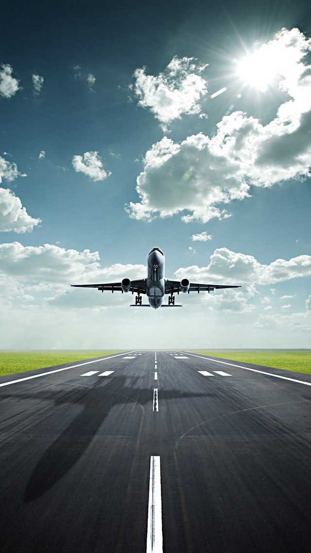 Jetliner runway blue sky clouds free wallpaper - medium preview image
