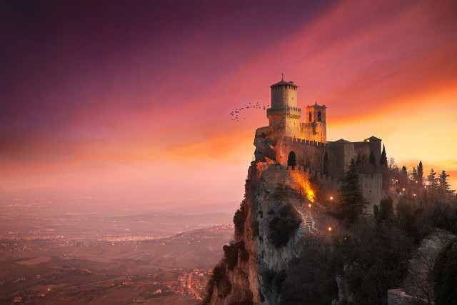 Castle cliff sunset birds flying free wallpaper - medium preview image
