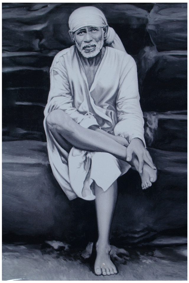 Man sitting rock legs crossed free wallpaper - medium preview image