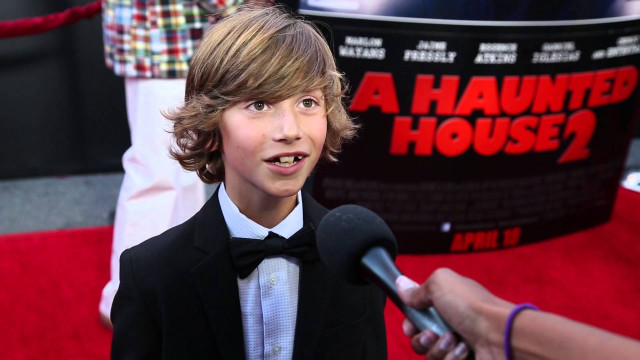 Young boy tuxedo interview reporter #2 free wallpaper - medium preview image