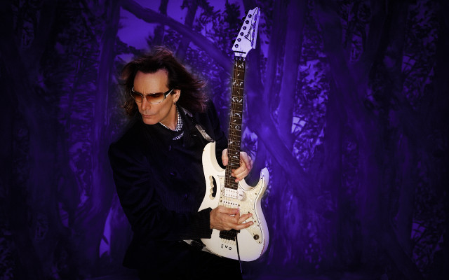 Man guitar sunglasses black suit free wallpaper - medium preview image