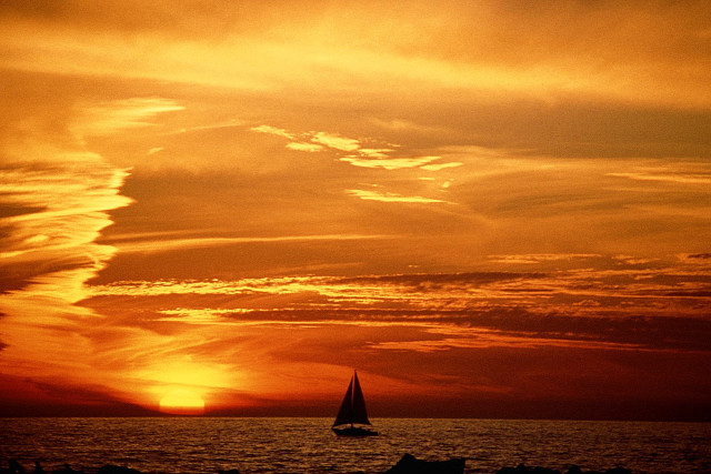 Sailboat ocean sunset dawn sky free wallpaper - medium preview image