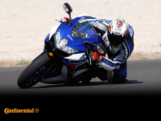 Person motorcycle race track helmet #4 free wallpaper - medium preview image