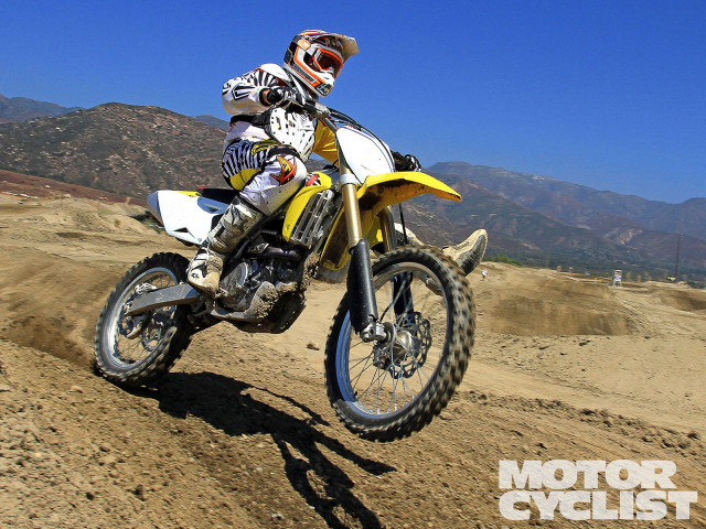 Desert mountain dirtbike riding outdoors free wallpaper - medium preview image