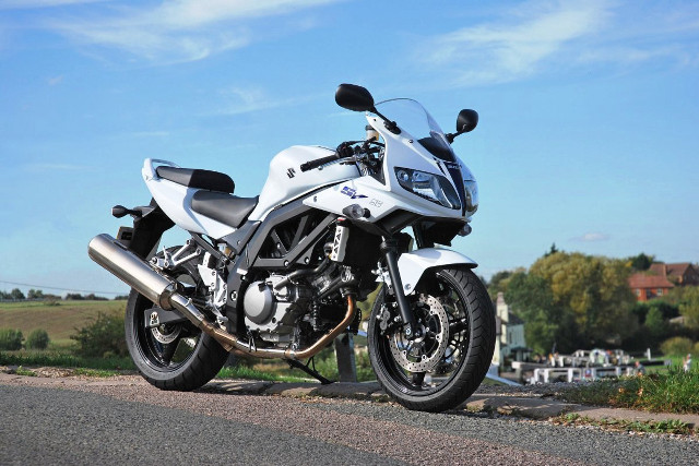 White motorcycle road grass trees free wallpaper - medium preview image