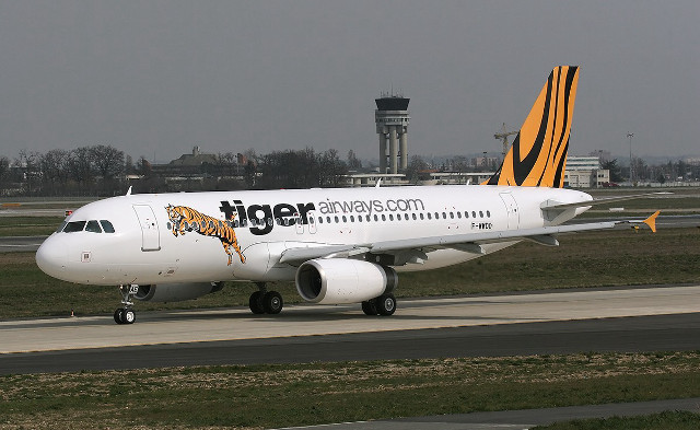 Tiger airlines plane runway airport free wallpaper - medium preview image