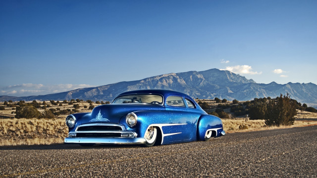 Blue car parked road mountain free wallpaper - medium preview image
